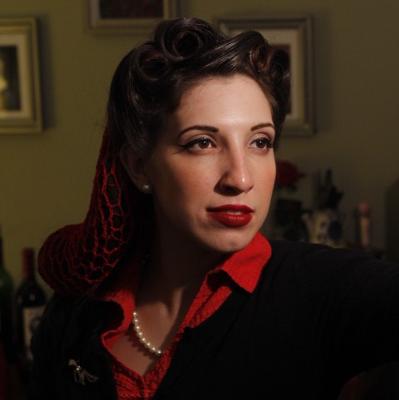 40's war time head shot with red snood and victory rolls 